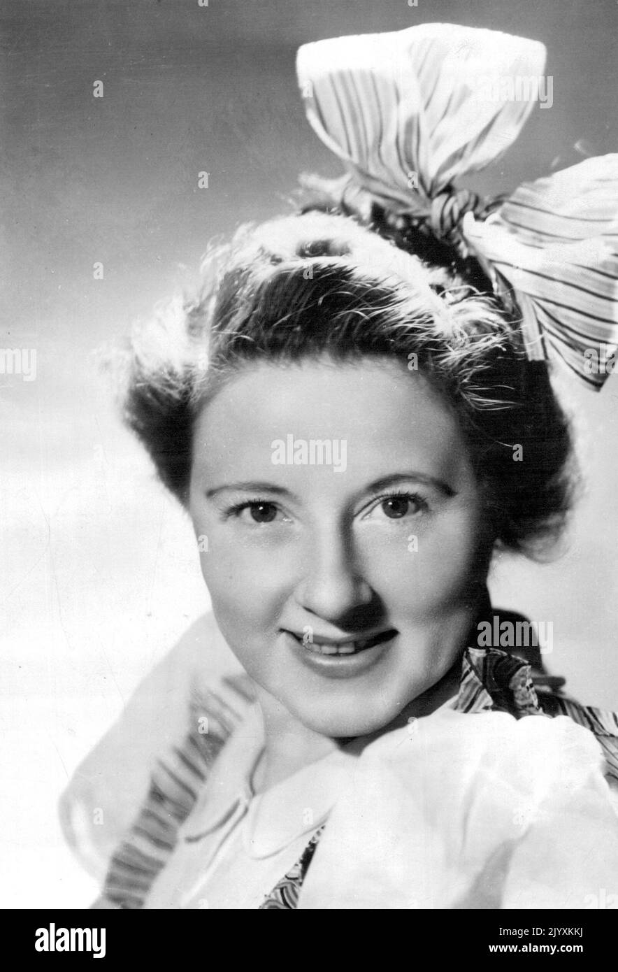 Bebe Scott, child impersonator and dramatic actress, who will appear at the Masquerade Ball on Friday, October 16, at the Town Hall, in aid of a convalescent hut for the new 103rd AGH. October 02, 1942. Stock Photo