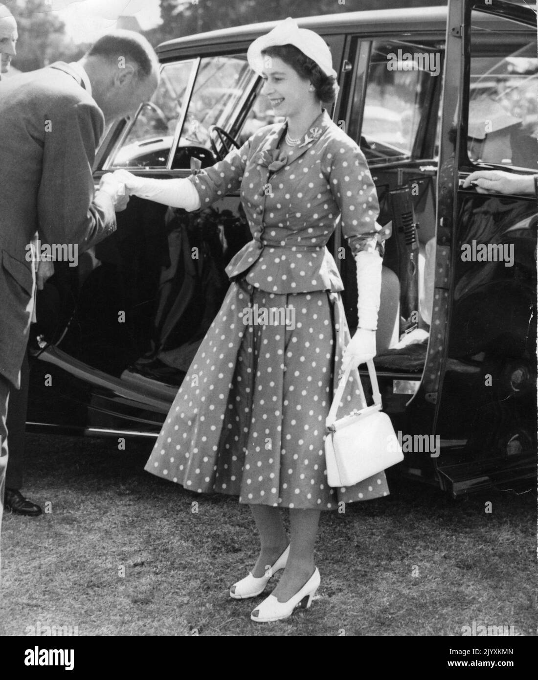 File photo dated 24/7/1952 of Queen Elizabeth II arriving for the first day of the Royal Windsor Horse Show in the Home Park of Windsor Castle. Elizabeth II was famed for her love of block colours and matching hats and her fashion became a legendary part of her role as monarch. The Queen was once described as 'power dressing in extremis' for using vibrant shades to make herself stand out from the crowd while her hats allowed her to be easily spotted but were small enough so her face was visible. Issue date: Thursday September 8, 2022. Stock Photo