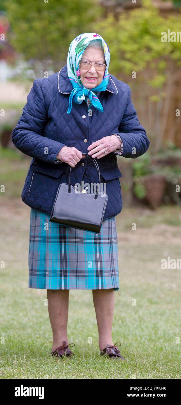File photo dated 12/5/2018 of Queen Elizabeth II during the Royal Windsor Horse Show at Windsor Castle, Berkshire. Elizabeth II was famed for her love of block colours and matching hats and her fashion became a legendary part of her role as monarch. The Queen was once described as 'power dressing in extremis' for using vibrant shades to make herself stand out from the crowd while her hats allowed her to be easily spotted but were small enough so her face was visible. Issue date: Thursday September 8, 2022. Stock Photo