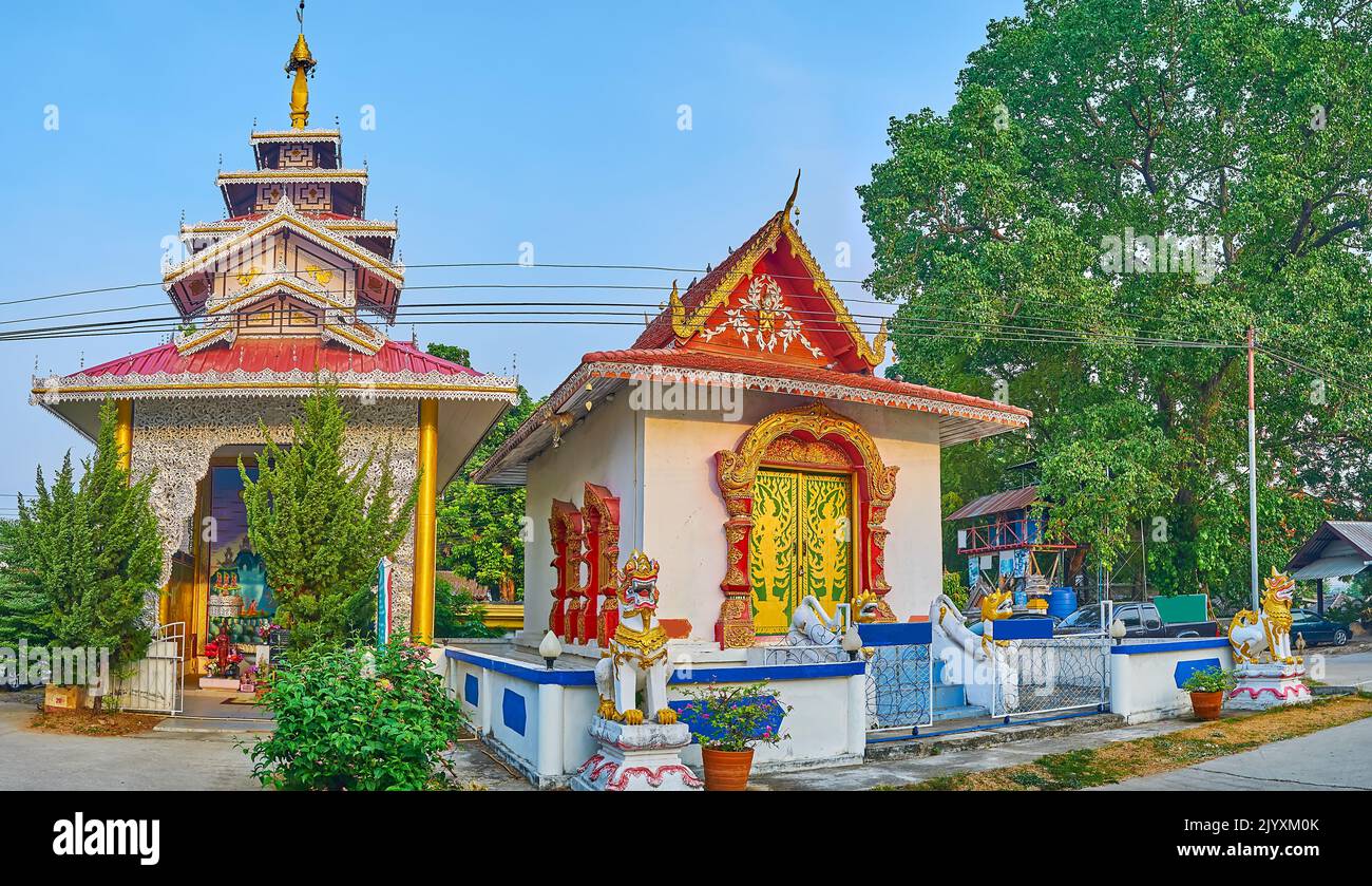 Panorama of Wat Pa Kham Temple with richly decorated shrines with Singha (Chinthe) Lions, Naga serpents on the bargeboards, Pai, Thailand Stock Photo