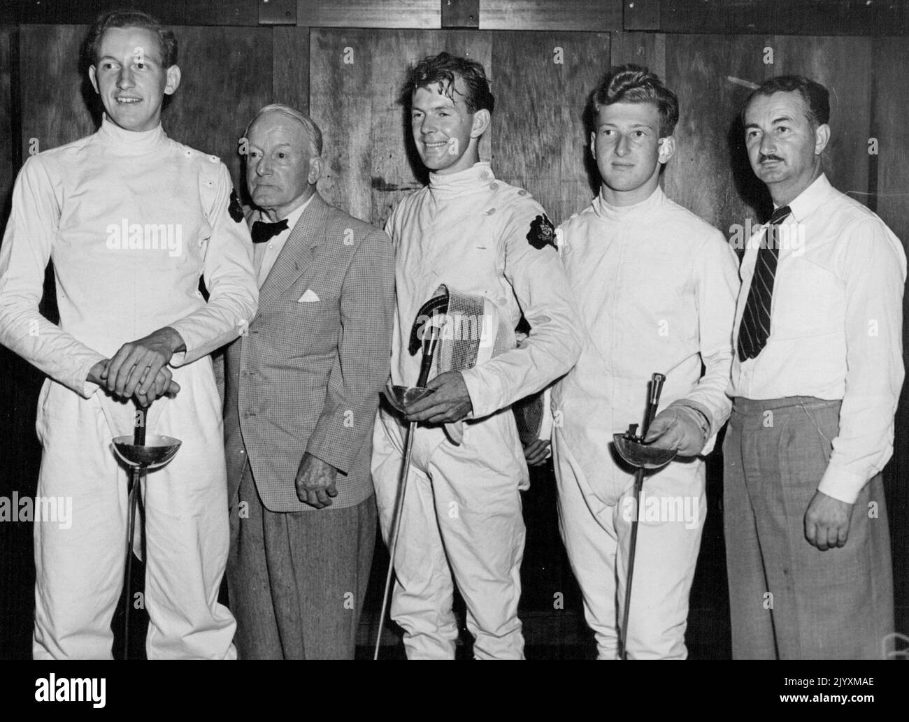 British Empire Games 1950. Empire Games Fencing at Auckland Feb. 8th, Australian fencing team winners of the Epee teams contest from left, G. Lund, (Victoria), Capt, F. Stuart, (coach, Sydney) C. Stanmore, (N.S.W), and A. L. Jay. February 14, 1950. Stock Photo