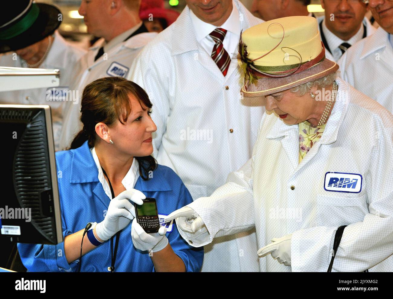 File photo dated 5/7/2010 of Queen Elizabeth II being shown a new product, at the final testing before packaging test area as she toured the RIM (Research in Motion) factory that produces the Blackberry mobile communications handset, in Waterloo, Canada. The Queen's life was steeped in tradition, but she kept up with the vast technological advances that occurred during her reign. She saw the advent of popular colour television, mobile phones, the internet and social media and held audiences and meetings over video conference. Issue date: Thursday September 8, 2022. Stock Photo