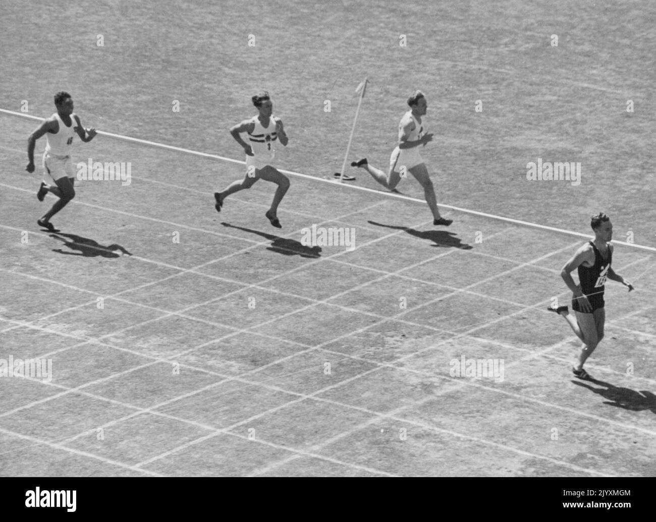 D.R. Jowett (NZ) defeating Archer (Eng) and W. DeGruchy (Australia) in first heat 220yds. February 22, 1950. Stock Photo