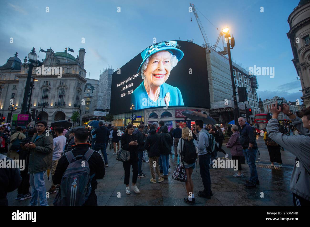 London, England, UK. 8th Sep, 2022. A tributet to Queen Elizabeth II is on display on giant screen in Piccadilly Circus after her death announcement. (Credit Image: © Tayfun Salci/ZUMA Press Wire) Stock Photo