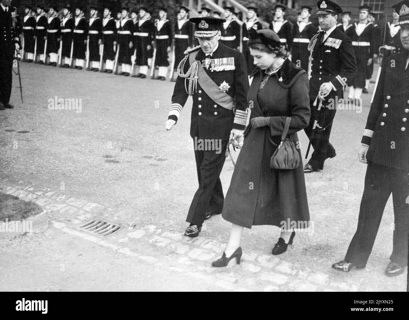 Princess Elizabeth Unveils Naval was memorial 10, stained glass windows at St. Georges Church Chatham. The Princes after the inspection of the guard, with Admiral Sir Henry Moore. October 29, 1950. (Photo by Daily Mail Contract Picture). Stock Photo
