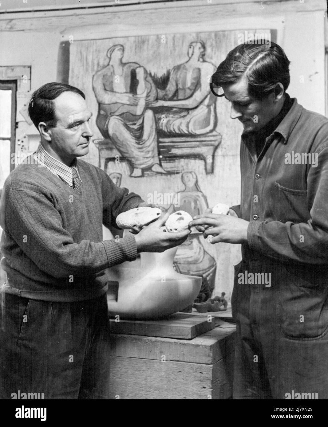 Like great sculptors of the past, Henry Moore has and ***** Wit a world to chose from, he has given coveted job ***** Oliffe Richmond, last year's winner of the New ***** Art Travelling Scholarship. 'Richmond has a fine ***** sculptor', Moore says. Here master shows disciple ***** collected in quarry near Dover. October 9, 1950. Stock Photo