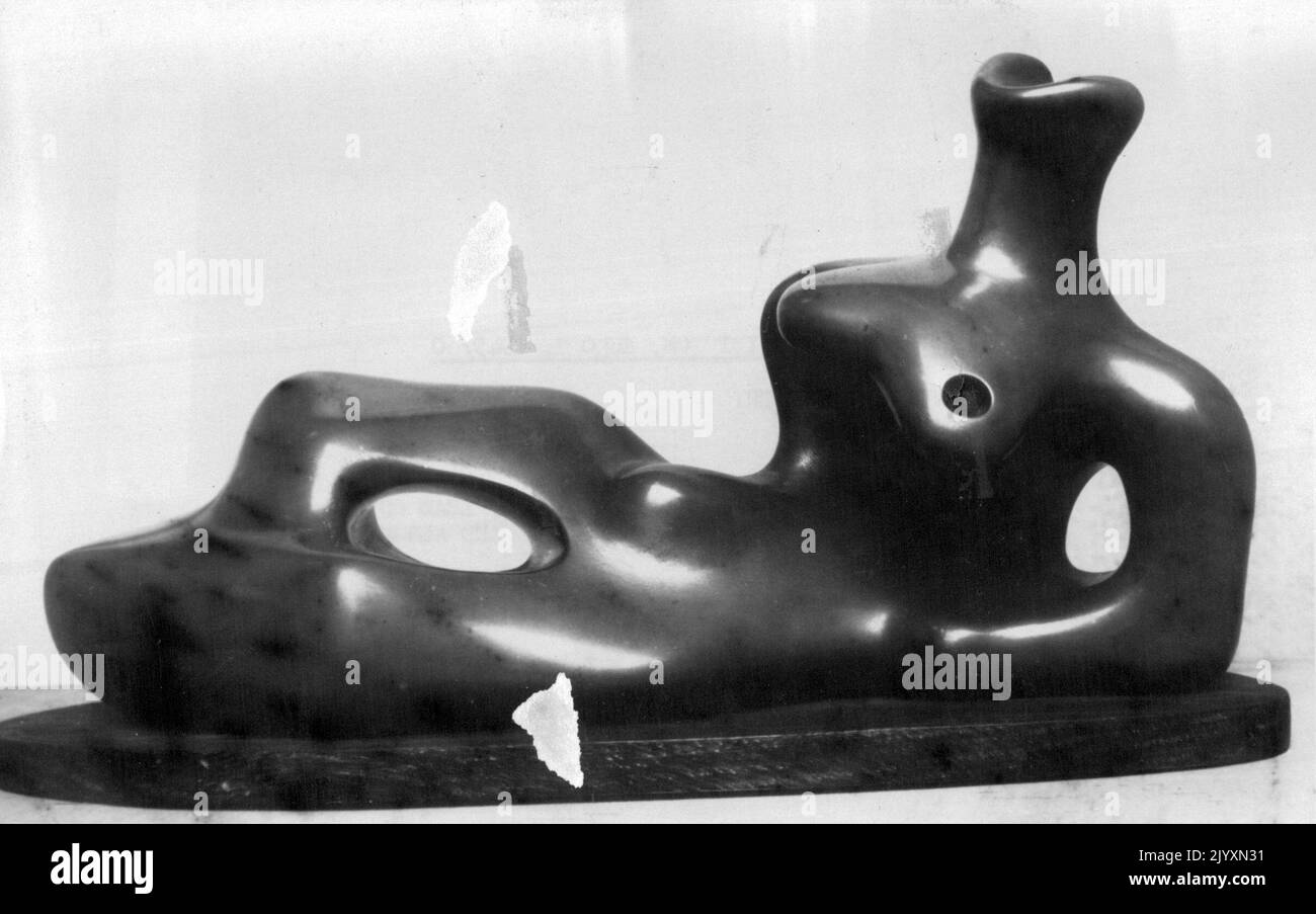 Henry Moore Exhibition, Europe, 1949/50 -- Catalogue Number. Title: Reclining Figure, 1939. Medium: Bronze cast of lead original in the Victoria and Albert Museum. Size: 12 inches long 30 cm. long. Owner: The British council, London. October 9, 1950. Stock Photo