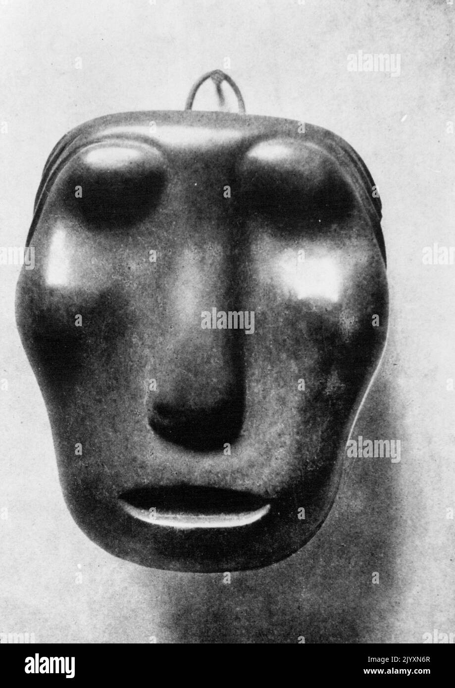 Stone mask, reveals Moore's interest in primitive art. October 25, 1947. Stock Photo