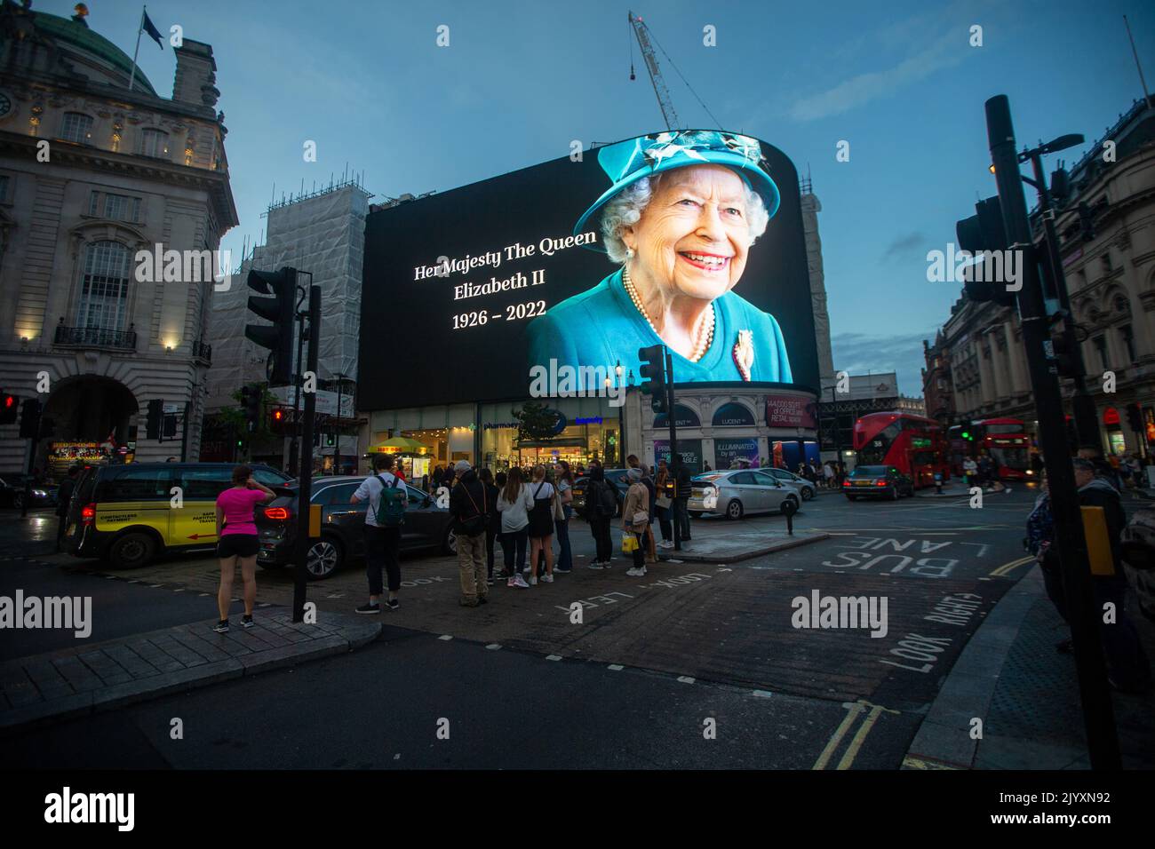 London, England, UK. 8th Sep, 2022. A tributet to Queen Elizabeth II is on display on giant screen in Piccadilly Circus after her death announcement. (Credit Image: © Tayfun Salci/ZUMA Press Wire) Stock Photo