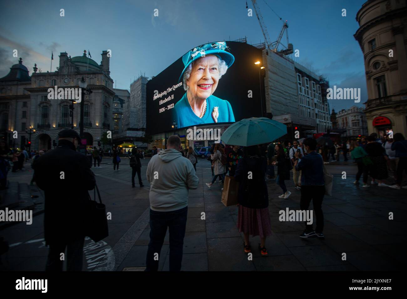 London, England, UK. 8th Sep, 2022. A tributet to Queen Elizabeth II is on display on giant screen in Piccadilly Circus after her death announcement. (Credit Image: © Tayfun Salci/ZUMA Press Wire) Stock Photo