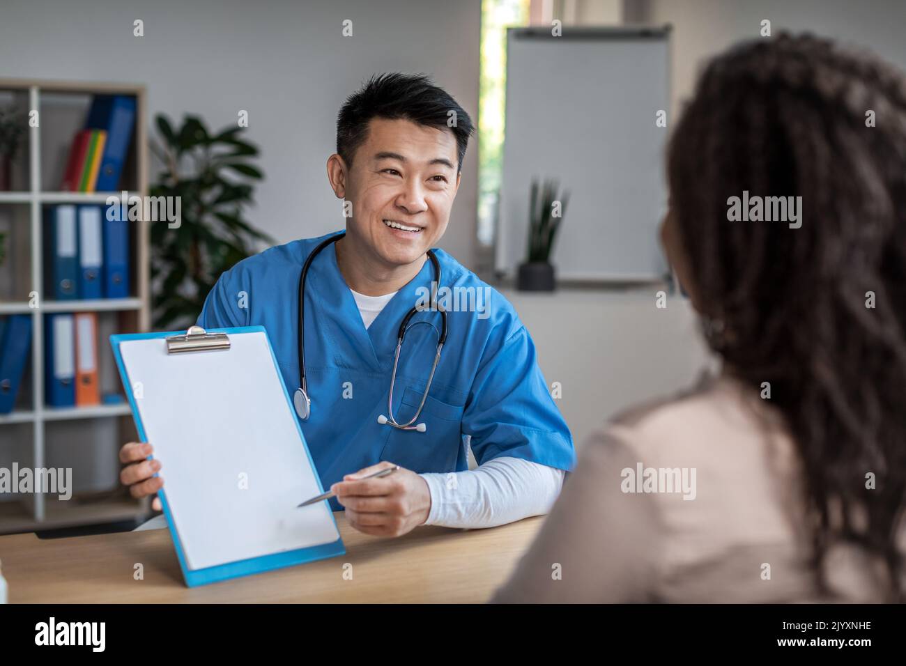 Asian male doctor document hi-res stock photography and images - Alamy