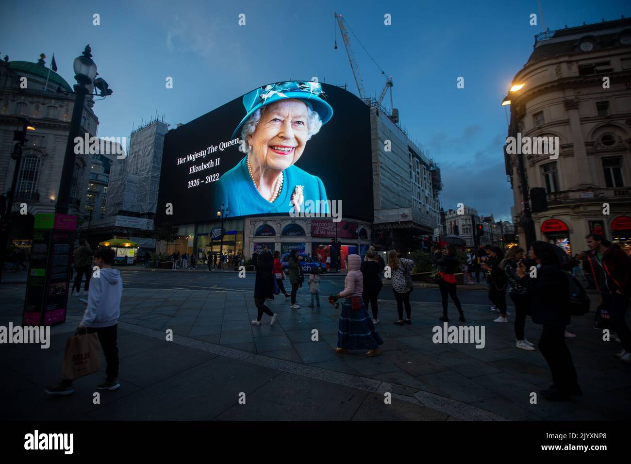 London, England, UK. 8th Sep, 2022. A tributet to Queen Elizabeth II is on display on giant screen in Piccadilly Circus after her death announcement. (Credit Image: © Tayfun Salci/ZUMA Press Wire) Stock Photo