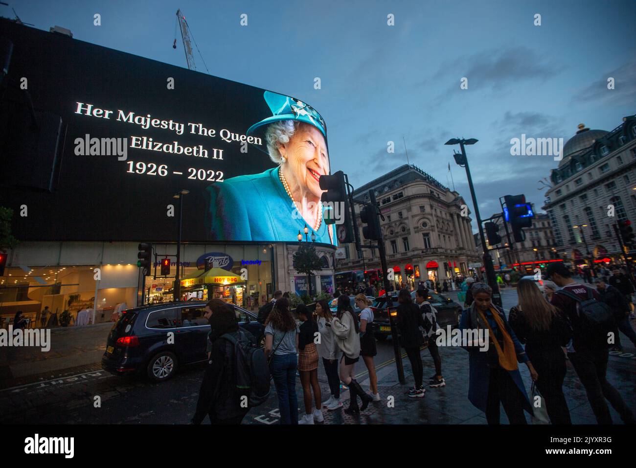 London, England, UK. 8th Sep, 2022. A tributet to Queen Elizabeth II is on display on giant screen in Piccadilly Circus after her death announcement. (Credit Image: © Tayfun Salci/ZUMA Press Wire) Stock Photo