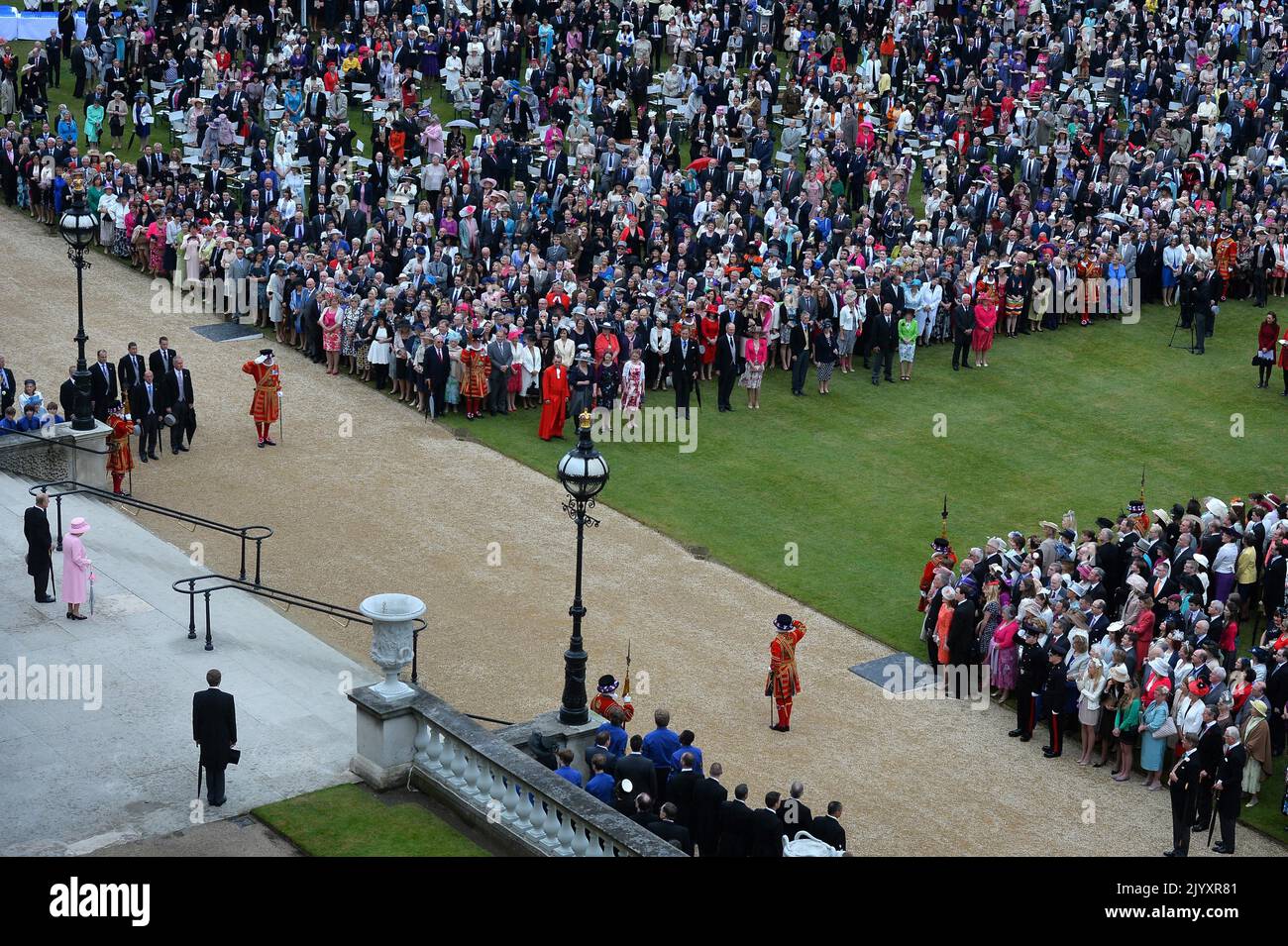 Queen elizabeth ii attending a garden party at buckingham palace hires