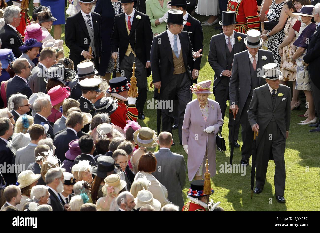 File photo dated 29/6/2011 of Queen Elizabeth II (second right in foreground) accompanied by the Duke of Edinburgh walking past guests at a royal garden party held in the grounds of Buckingham Palace, London. Approximately 1.45 million people have attended a garden party at Buckingham Palace or the Palace of Holyroodhouse since 1952. Issue date: Thursday September 8, 2022. Stock Photo