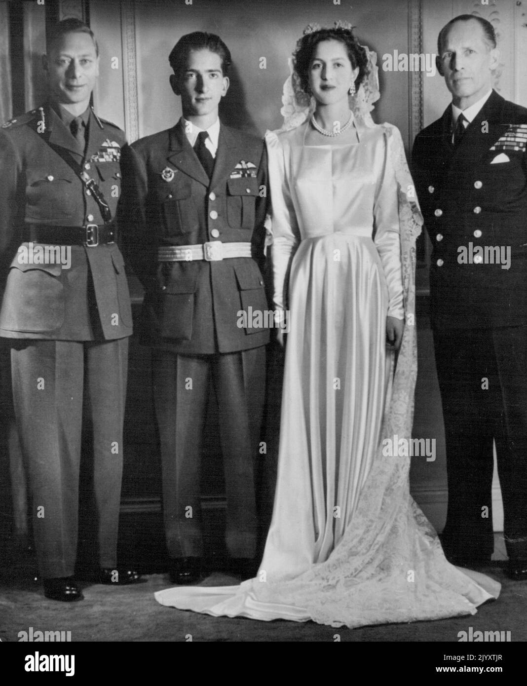 King Peter's Wedding Our Photograph was made in London on the occasion of the wedding of King Peter of Yugoslavia to Princess Alexander of Greece. Left to Right: King George VI of England, the King Peter, Princess Alexandra and King George of the Hellenes. June 6, 1944. (Photo by European) Stock Photo