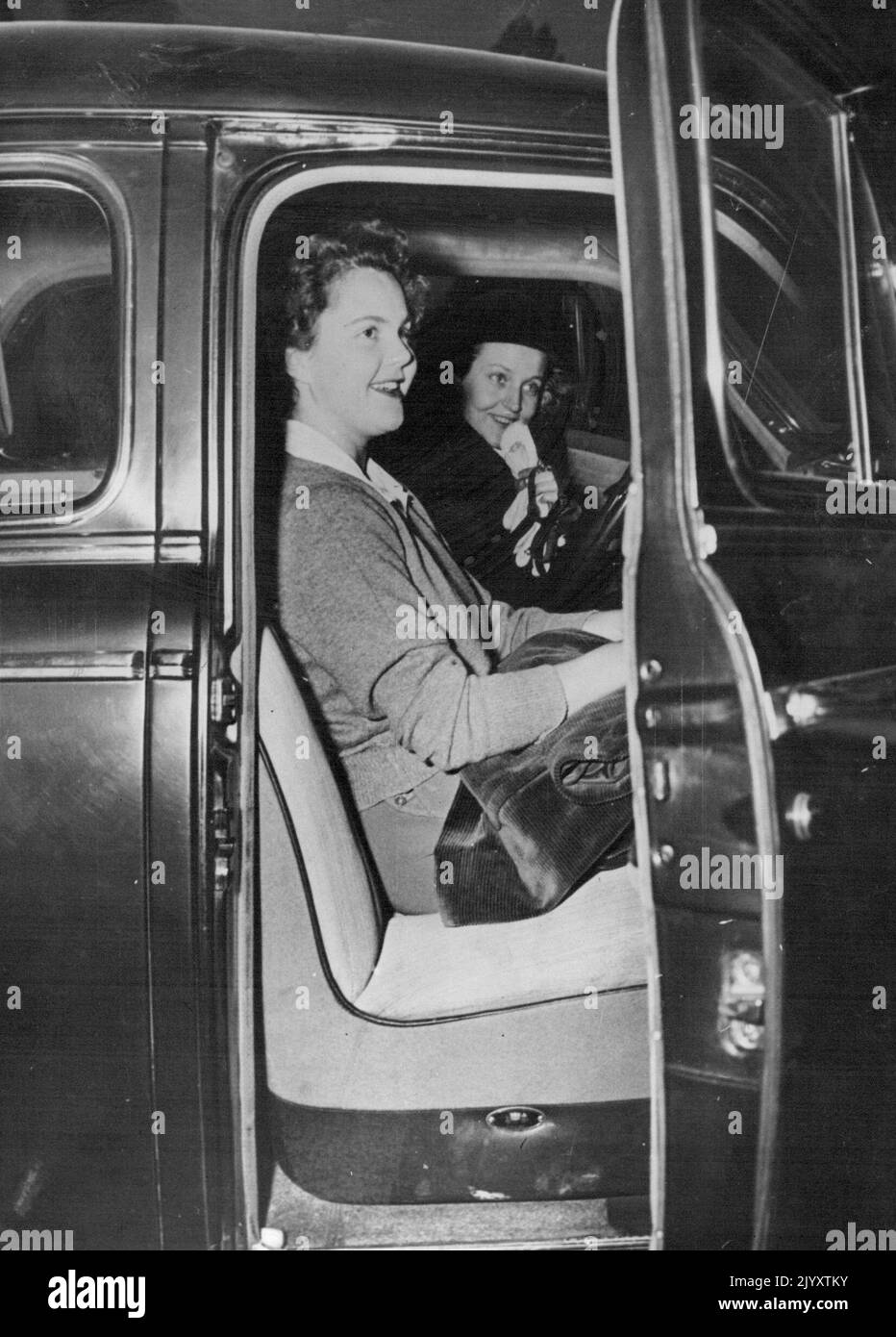 Italian Ex-King ***** in Geneva Princess Maria Pia. eldest daughter of Umberto of Savoy, ex-King of Italy, photographed in the ex-King's car at Geneva, where he has arrived to stay for a few days with his wife at the Castle of Merlinge. October 30, 1950. (Photo by Paul Popper Ltd.) Stock Photo