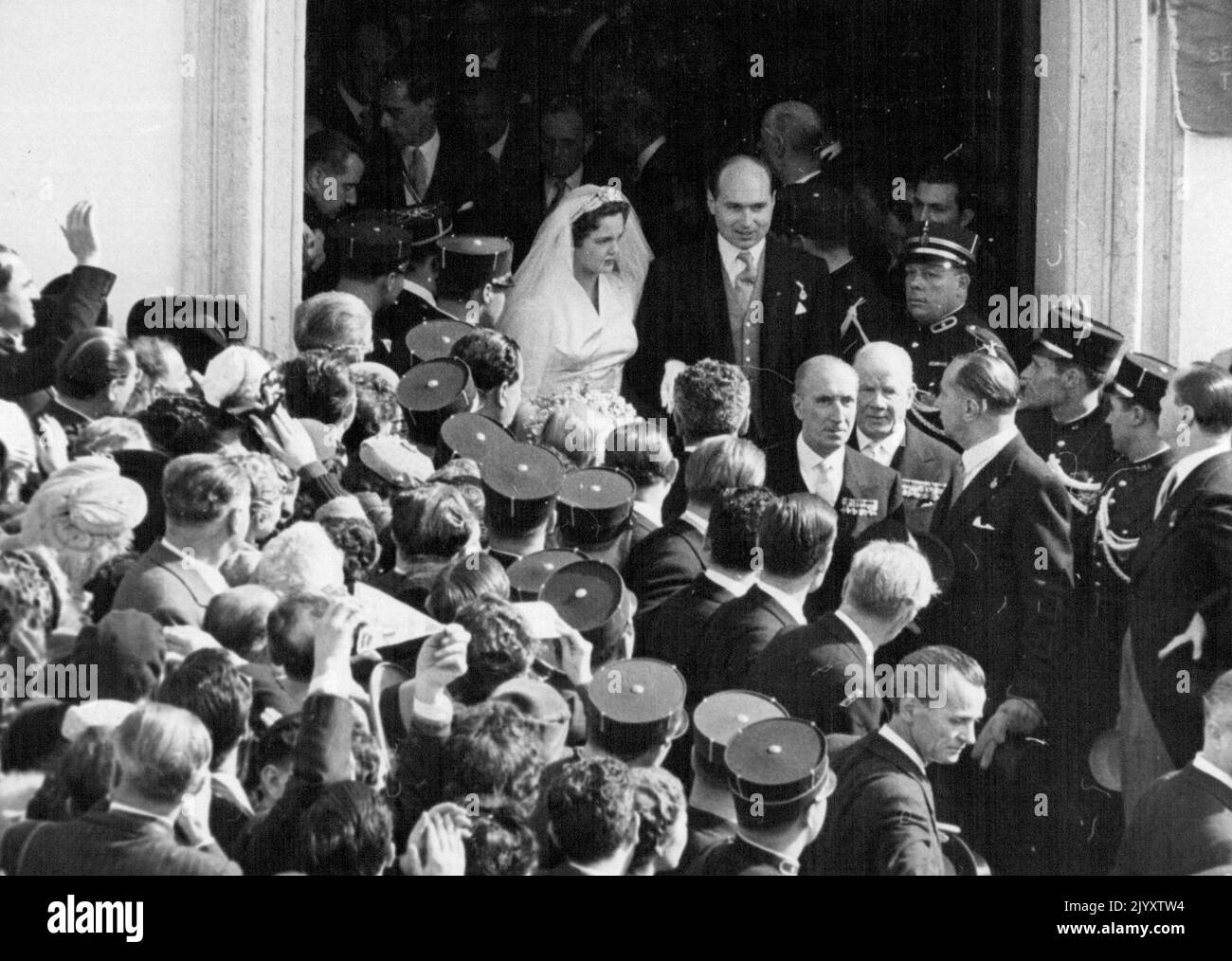 PS: The bride and bridegroom, Princess Maria Pia of Italy and Prince Alexander of Yugoslavia, after their wedding at the parish church of Cascais, near Estoril. February 15, 1955. (Photo by Daily Mirror) Stock Photo
