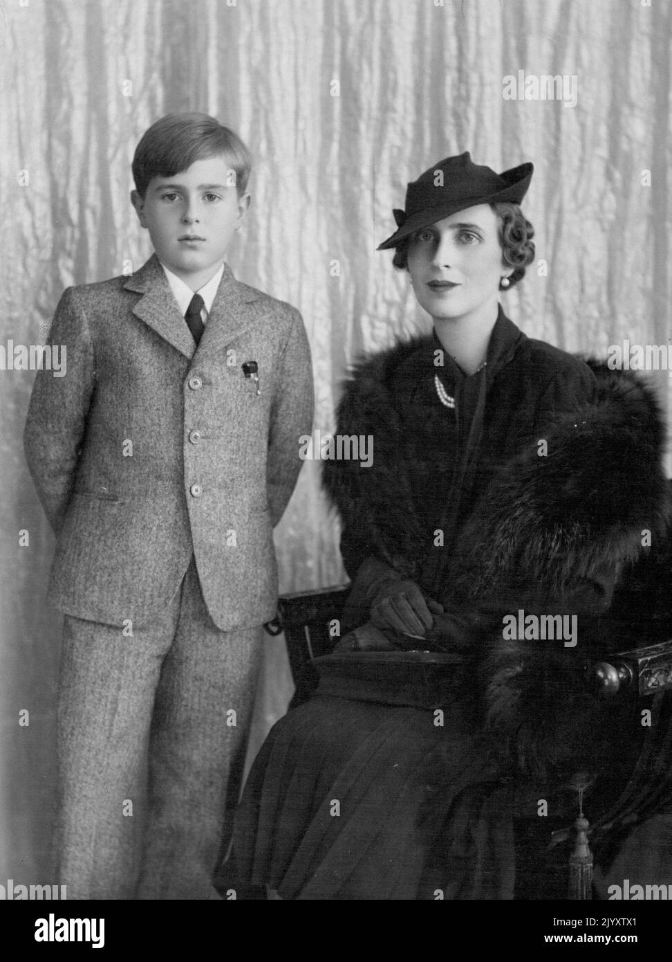 Lovely Sister of our Lovely Duchess with her son - Wife of the Prince Regent of Yugoslavia - Her Royal highness Princess Paul of Yugoslavia with her son Prince Nicholas. Her Royal highness Princess Paul of Yugoslavia who is in England on a visit is the wife of H.R.H. Prince Paul of Yugoslavia. She is the daughter of T.R.H. Prince and Princess Nicholas of Greece and sister of H.R.H. The Duchess of Kent. Her son Prince Nicholas has just entered on his first term at Sandroyd school where his cousin Prince Tomislav is now in his third term. This is the same school that little King Peter of Yugosla Stock Photo