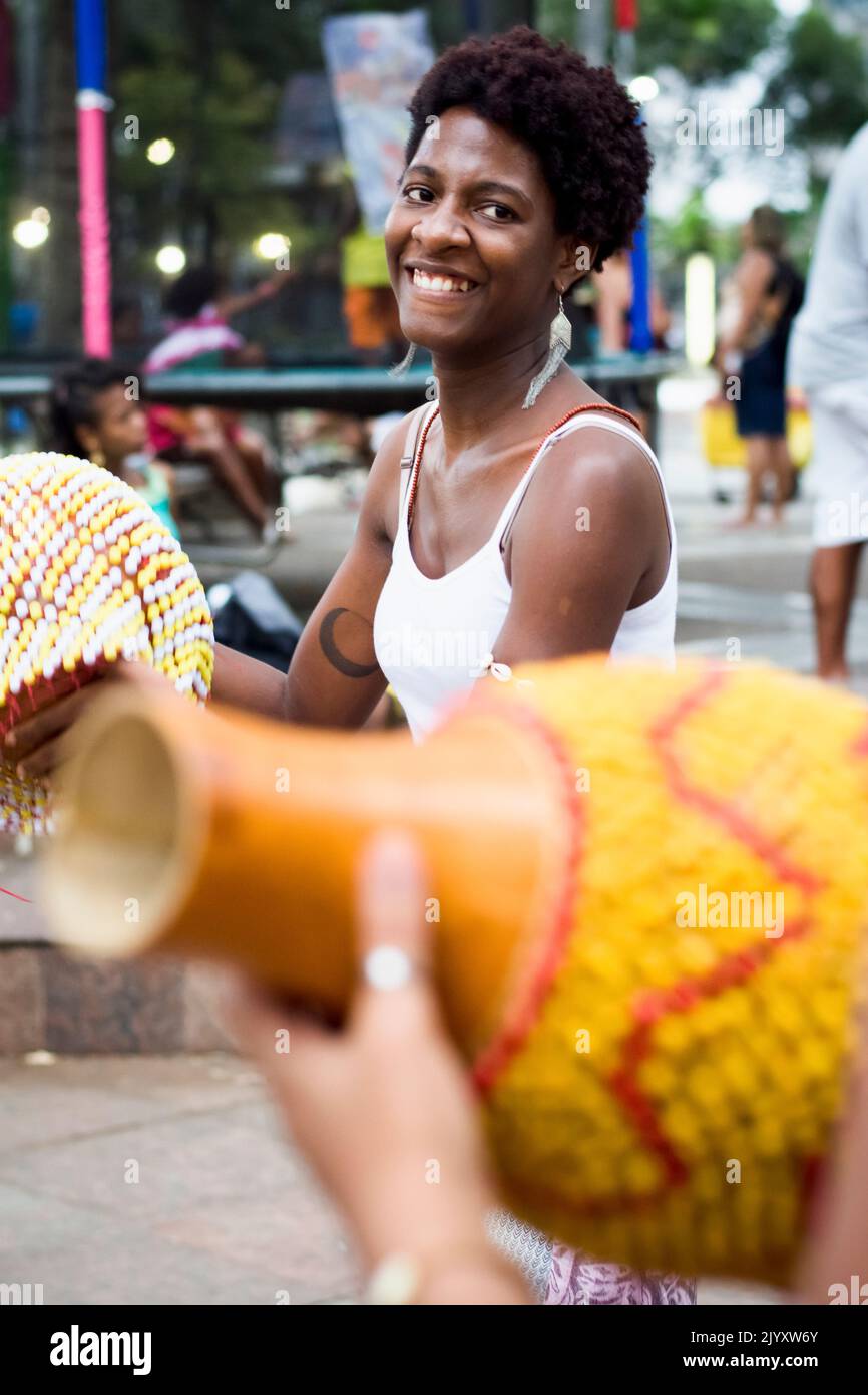 Salvador, Bahia, Brazil - September 17, 2016: Women playing Abe or Xequere, percussion musical instrument created in Africa. Salvador, Bahia, Campo Gr Stock Photo