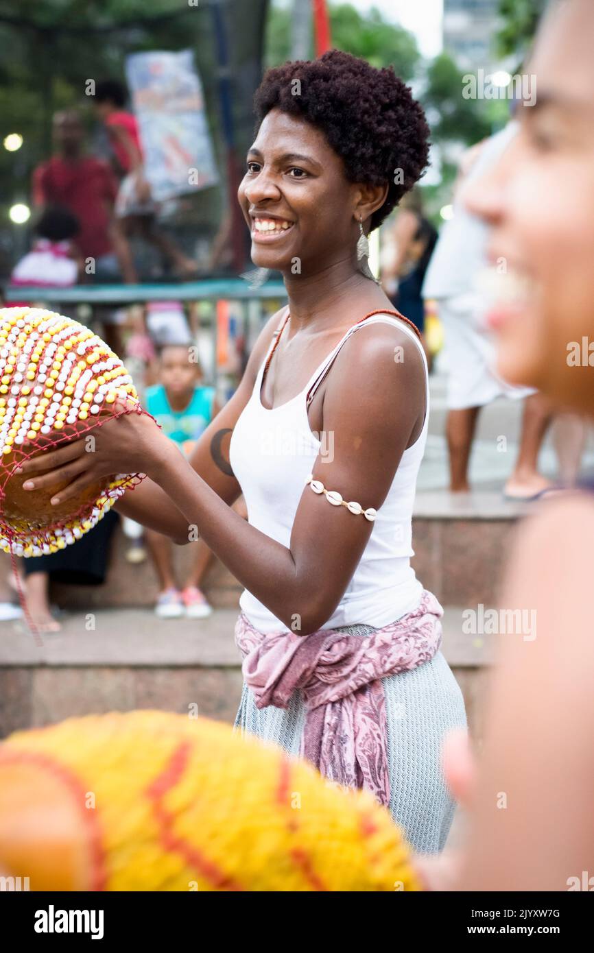 Salvador, Bahia, Brazil - September 17, 2016: Women playing Abe or Xequere, percussion musical instrument created in Africa. Salvador, Bahia, Campo Gr Stock Photo