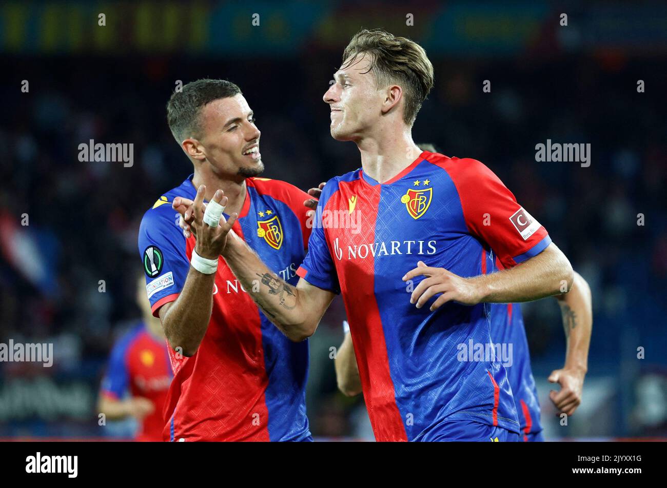 Soccer Football - Europa Conference League - Group H - Basel v Pyunik - St. Jakob-Park, Basel, Switzerland - September 8, 2022 Basel's Wouter Burger celebrates scoring their third goal with Darian Males REUTERS/Stefan Wermuth Stock Photo