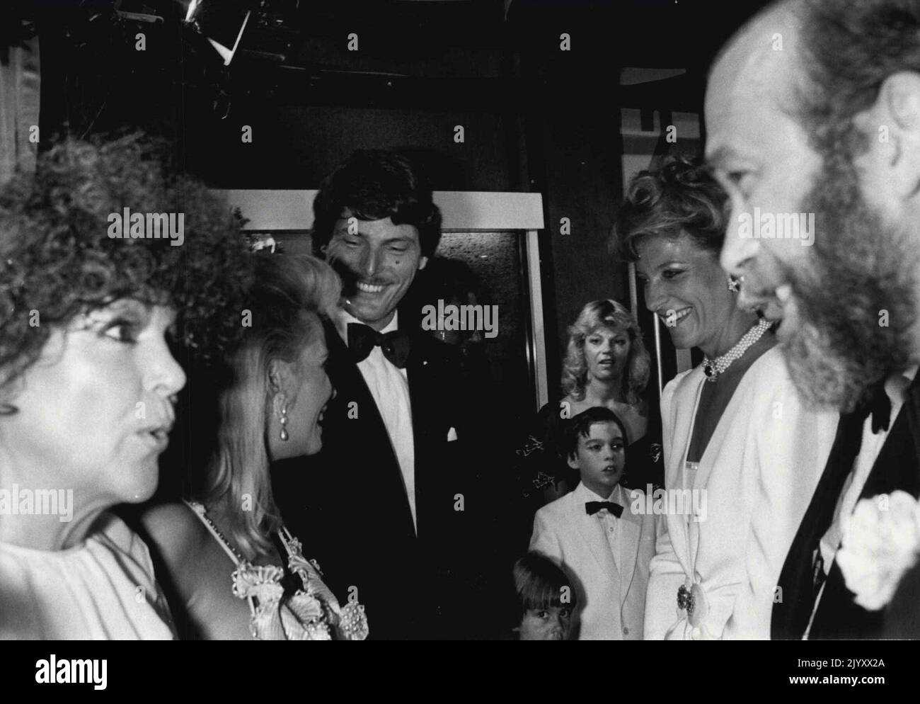 Clark Kent Meets The Royal Kents -- Christopher and Pamela chat with Princess Michael and her husband. What a super spectacular it really was .... The night that Superman Clark Kent and her handsome husband. It happened at the Royal premier of Superman 111, which stars heartthrob actor Christopher Reeve. He was there with his girl friend Gae Exton, zapping rumours that the couple had split up. July 19, 1933. (Photo by Daily Star). Stock Photo