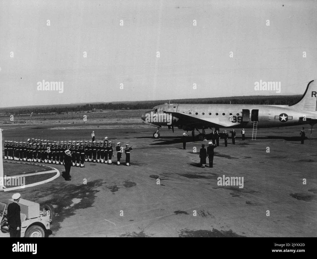 Scene on the tanner at Naval Air Station Nowra, ***** the arrival of Admiral A.W. Radford USN., Commander in Chief of U.S. of Forces in the Pacific, on a flying right. May 16, 1950. Stock Photo
