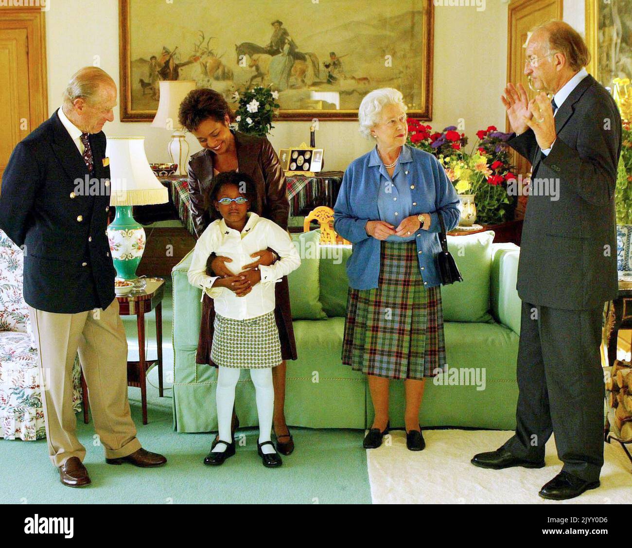 File photo dated 6/9/2005 of Queen Elizabeth II and the Duke of Edinburgh talking to the Governor General Designate of Canada Michaelle Jean, her daughter Mlle Marie-Eden Lafond and Jean-Daniel Lafond at Balmoral castle in Aberdeenshire. Scotland was a special place for the Queen over the decades, both for holidays and royal duties. She spent part of her honeymoon at Birkhall on the rural Balmoral estate in Aberdeenshire and the estate was her favoured residence in Scotland. Issue date: Thursday September 8, 2022. Stock Photo