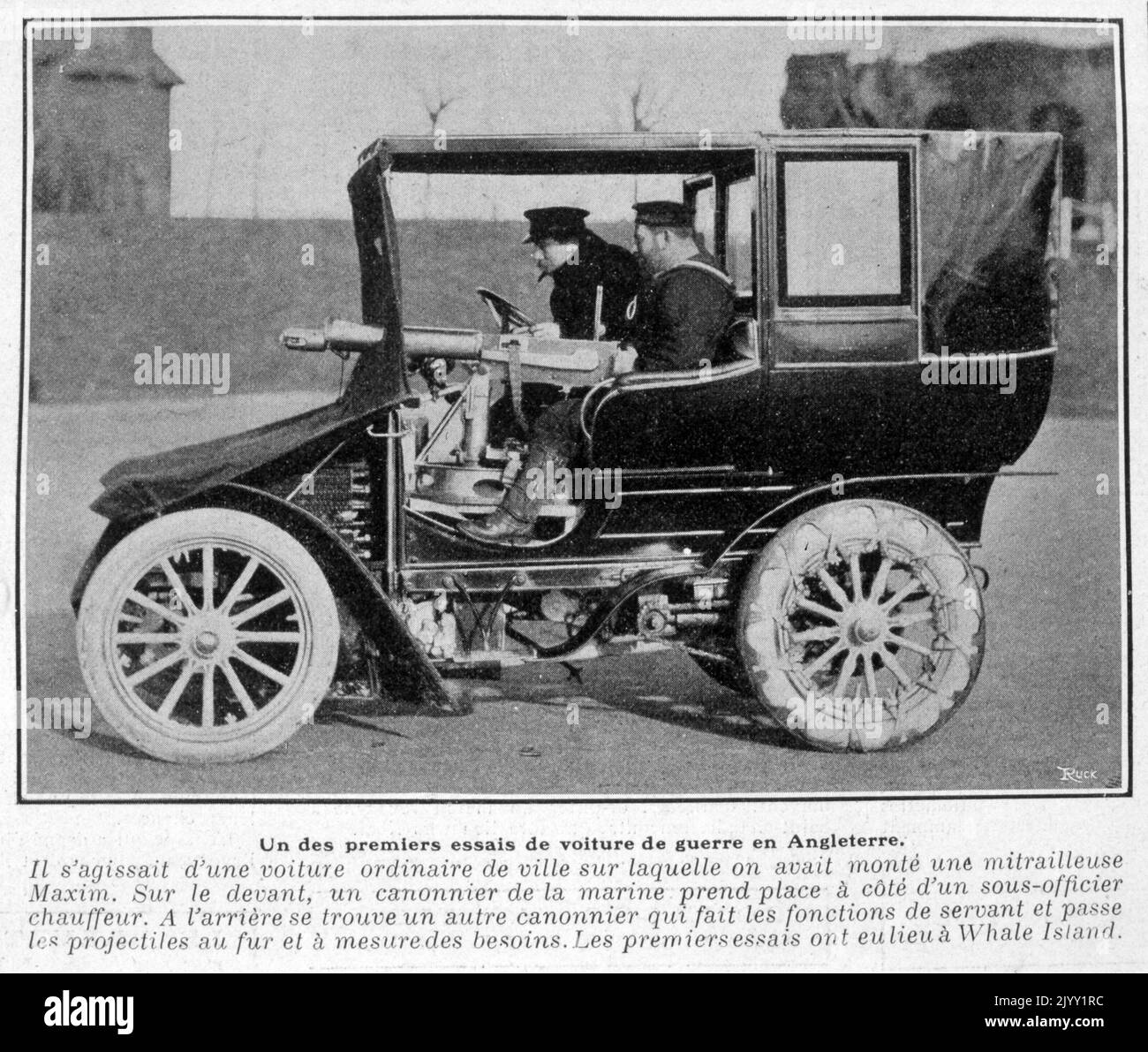 Vintage photograph of an English automobile with chauffer and passenger. 1905 Stock Photo