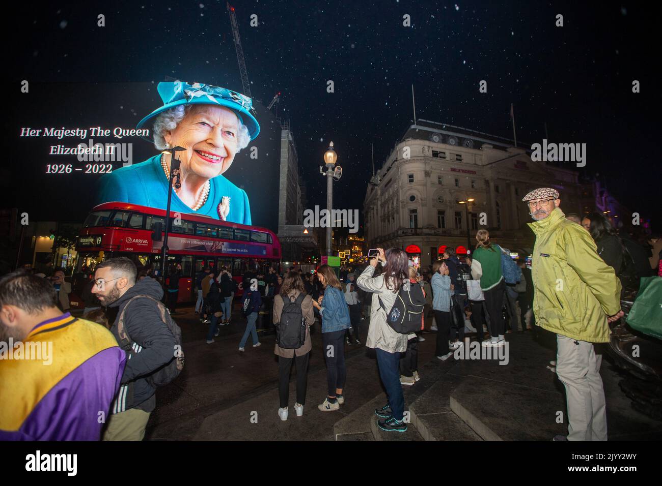 London, England, UK. 8th Sep, 2022. A tributet to Queen Elizabeth II is on display on giant screen in Piccadilly Circus after her death announcement. (Credit Image: © Tayfun Salci/ZUMA Press Wire) Stock Photo