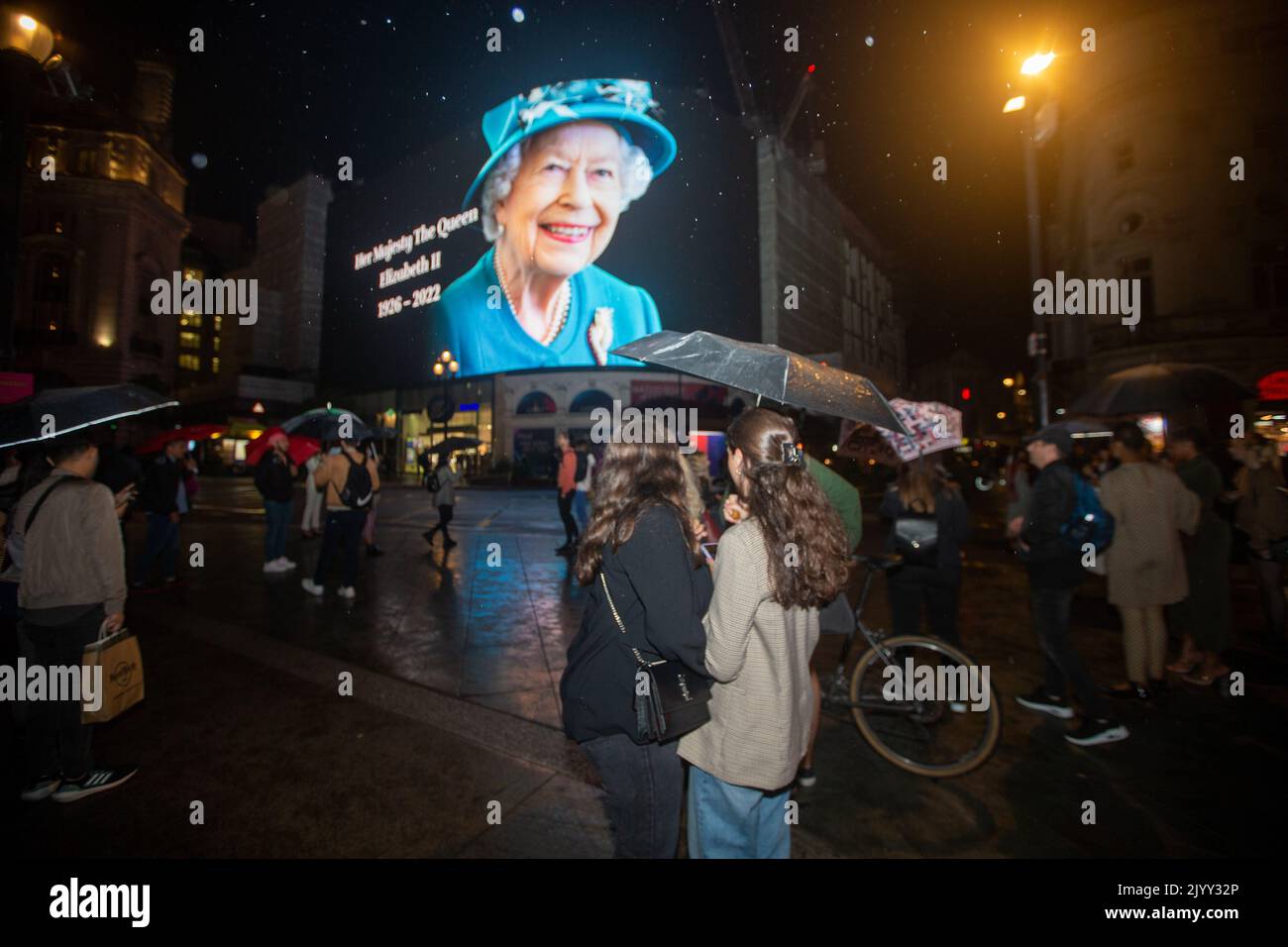 London, England, UK. 8th Sep, 2022. A tributet to Queen Elizabeth II is on display on giant screen in Piccadilly Circus after her death announcement. (Credit Image: © Tayfun Salci/ZUMA Press Wire) Stock Photo
