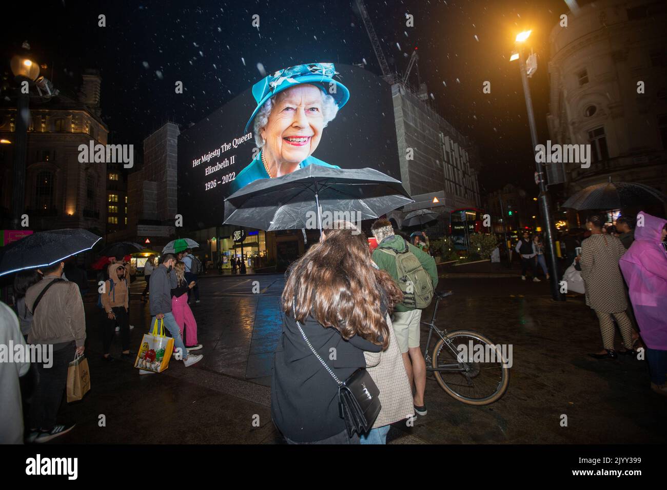 London, England, UK. 8th Sep, 2022. A tributet to Queen Elizabeth II is on display on giant screen in Piccadilly Circus after her death announcement. (Credit Image: © Tayfun Salci/ZUMA Press Wire) Stock Photo