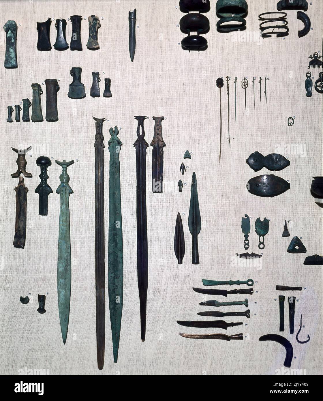 Iron Age metalwork weapons; Hallstatt culture; Western and Central European culture of Early Iron Age Europe from the 8th to 6th centuries BC, developing out of the Urnfield culture of the 12th century BC (Late Bronze Age). The weapons include, axes, spears, swords and daggers. Stock Photo