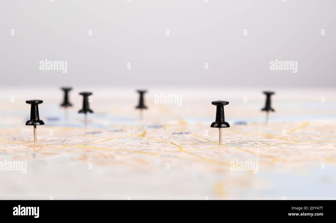 Pins on map. Trip planning. Route marking with pushpins. Adventure