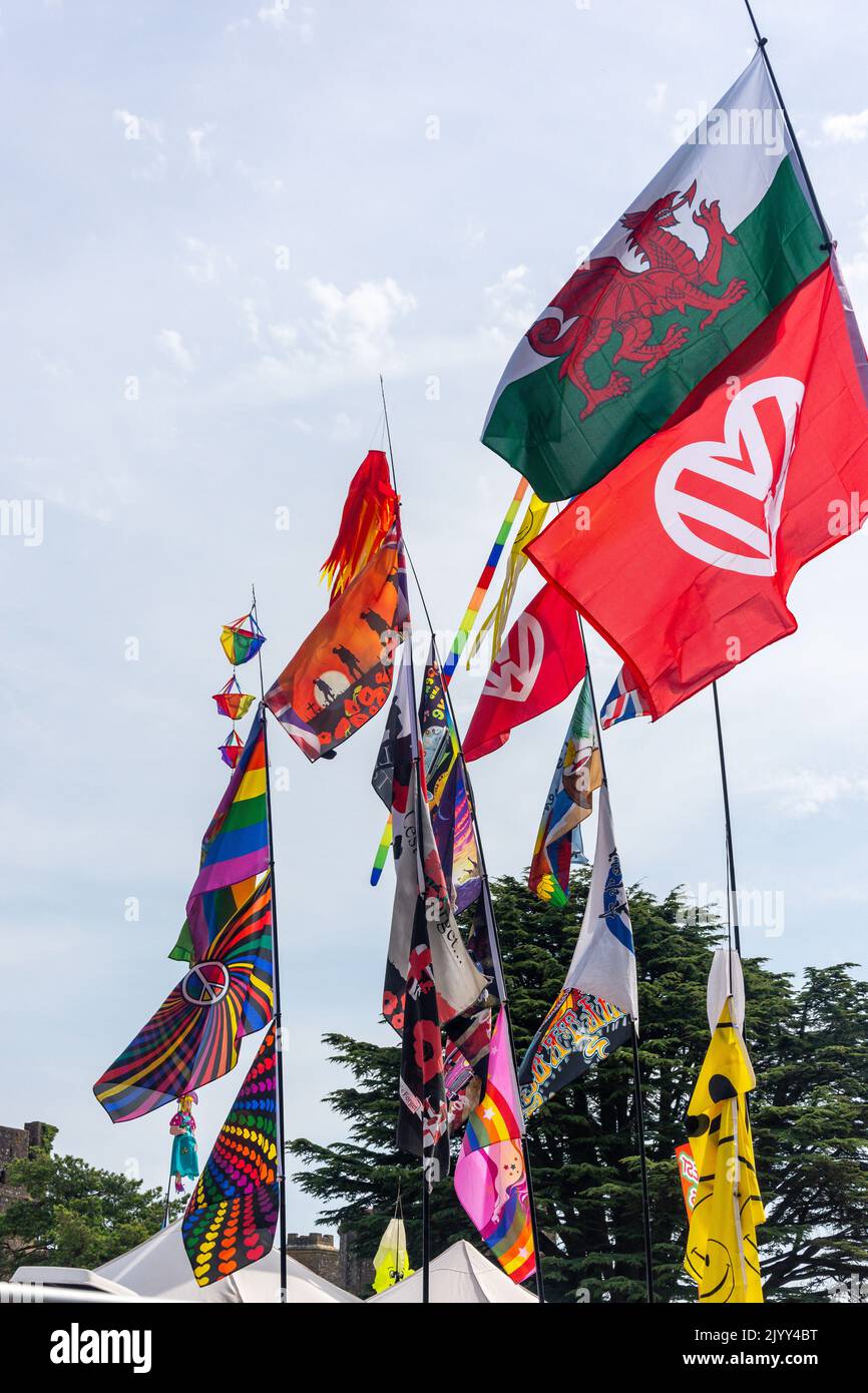 Colourful flags at 'Dubs at the Castle' VW camping festival, Caldicot Castle grounds, Caldicot, Monmouthshire, Wales (Cymru), United Kingdom Stock Photo