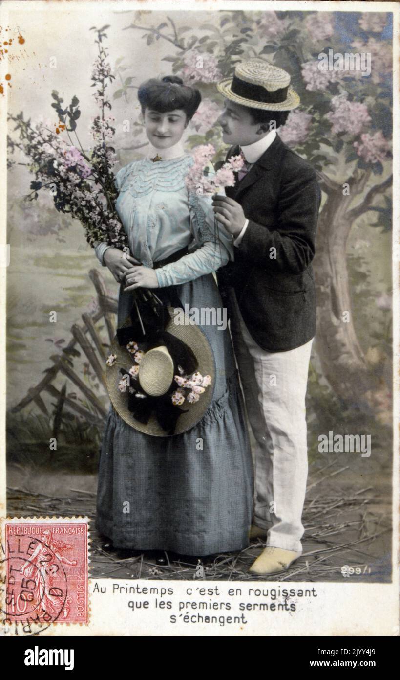 Vintage French postcard showing a photograph of a romantic couple Stock