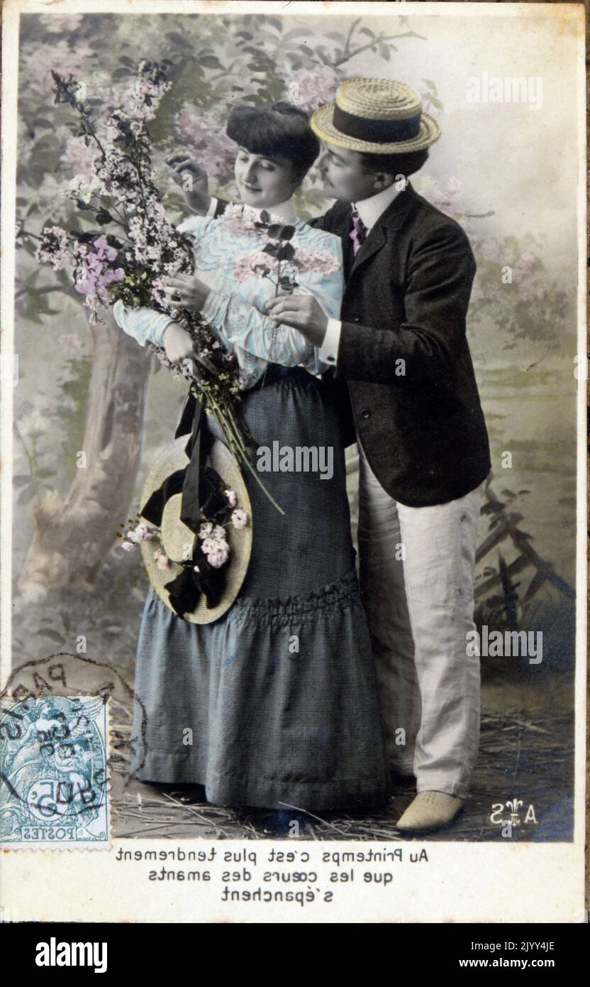 Vintage French postcard showing a photograph of a romantic couple Stock Photo