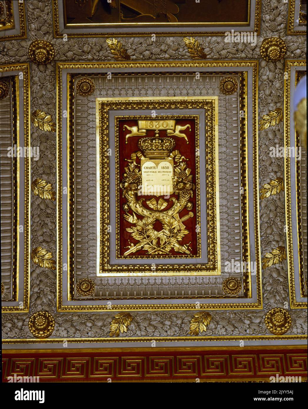 Detail from the Salle de 1830, Palace of Versailles. Versailles was a royal chateau in the Ile-de-France region of France. Versailles was the seat of political power in the Kingdom of France from 1682, when King Louis XIV moved the royal court from Paris, until the royal family was forced to return to the capital in October 1789, within three months after the beginning of the French Revolution. In the 19th century the Museum of the History of France was founded in Versailles, at the behest of Louis-Philippe I, who ascended to the throne in 1830. The entire second floor (premier etage) of the A Stock Photo