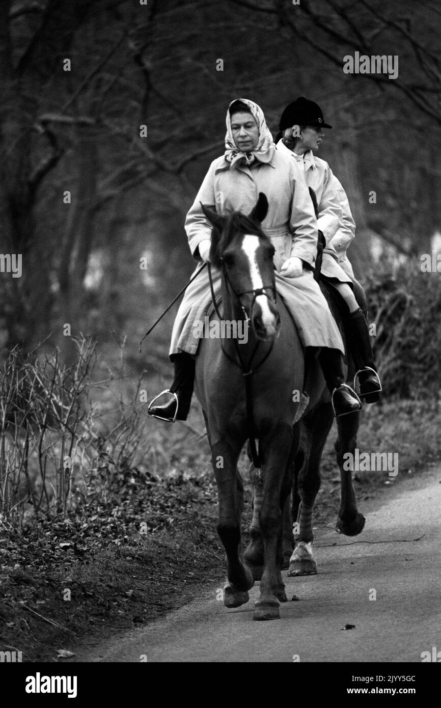 File photo dated 31/12/1980 of Queen Elizabeth II out for a New Year's Eve ride at Sandringham with a member of her household. Issue date: Thursday September 8, 2022. Stock Photo