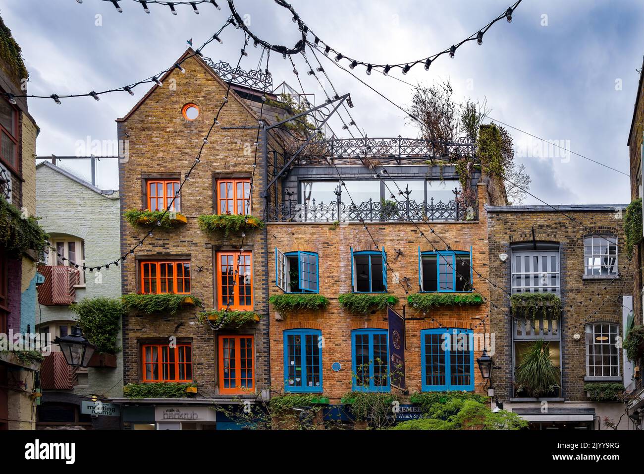 LONDON, ENGLAND - JULY 21st, 2022: Colourful houses in Neal's Yard, Covent Garden Stock Photo
