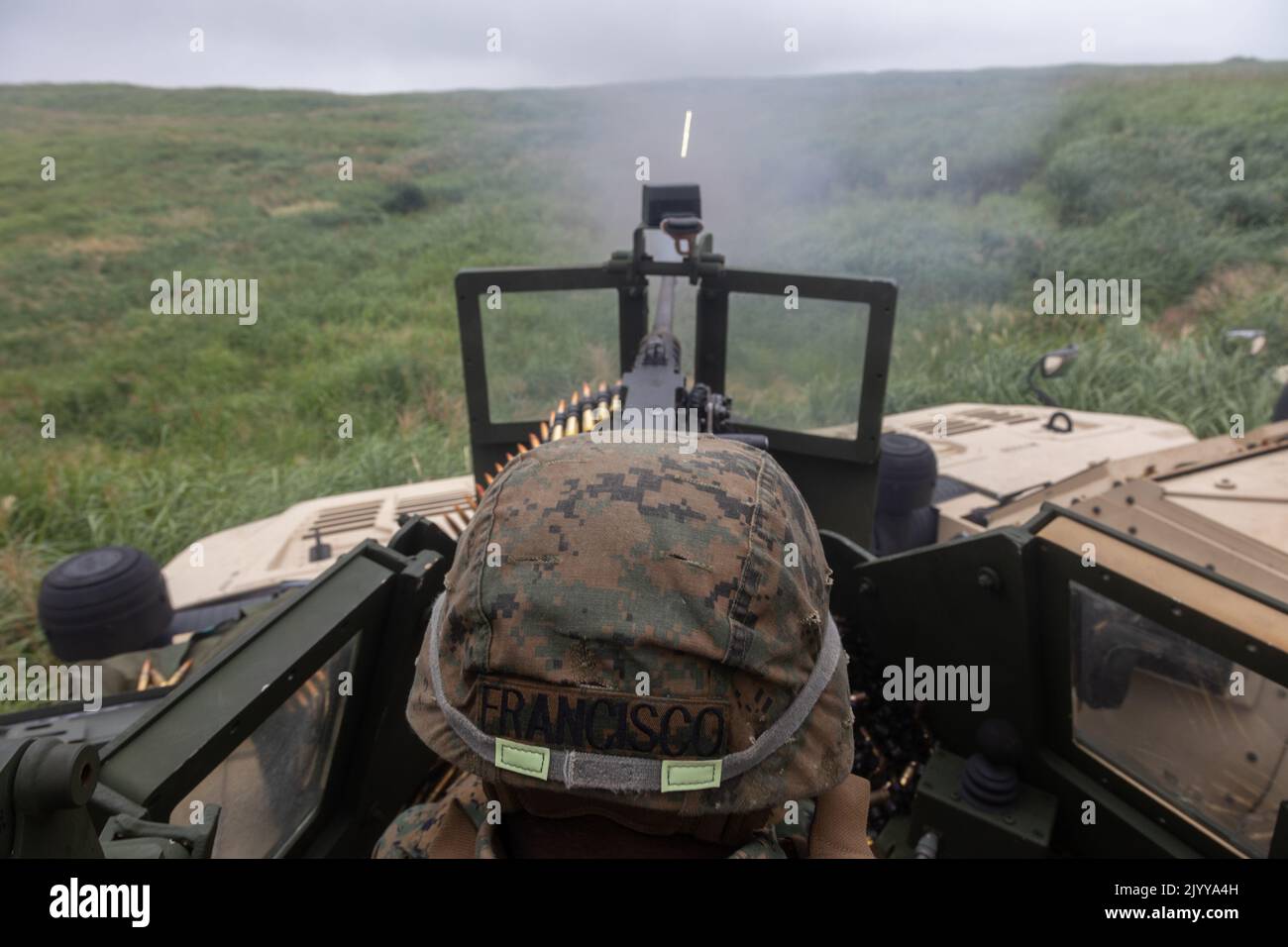 U.S. Marine Corps Lance Cpl. Brandon Francisco, a field artillery cannoneer with 3d Battalion, 12th Marines, 3d Marine Division, fires an M2 .50 caliber heavy machine gun during Artillery Relocation Training Program 22.2 at the Combined Arms Training Center, Camp Fuji, Japan, Aug. 22, 2022. The skills developed at ARTP increase the proficiency and readiness of the only permanently forward-deployed artillery unit in the Marine Corps, enabling them to provide precision indirect fires. (U.S. Marine Corps photo by Lance Cpl. Jaylen Davis) Stock Photo