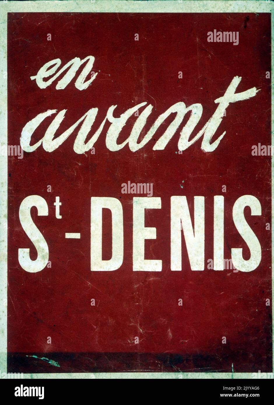 Red and white poster image with text only reading 'Come on St-Denis!'. Stock Photo