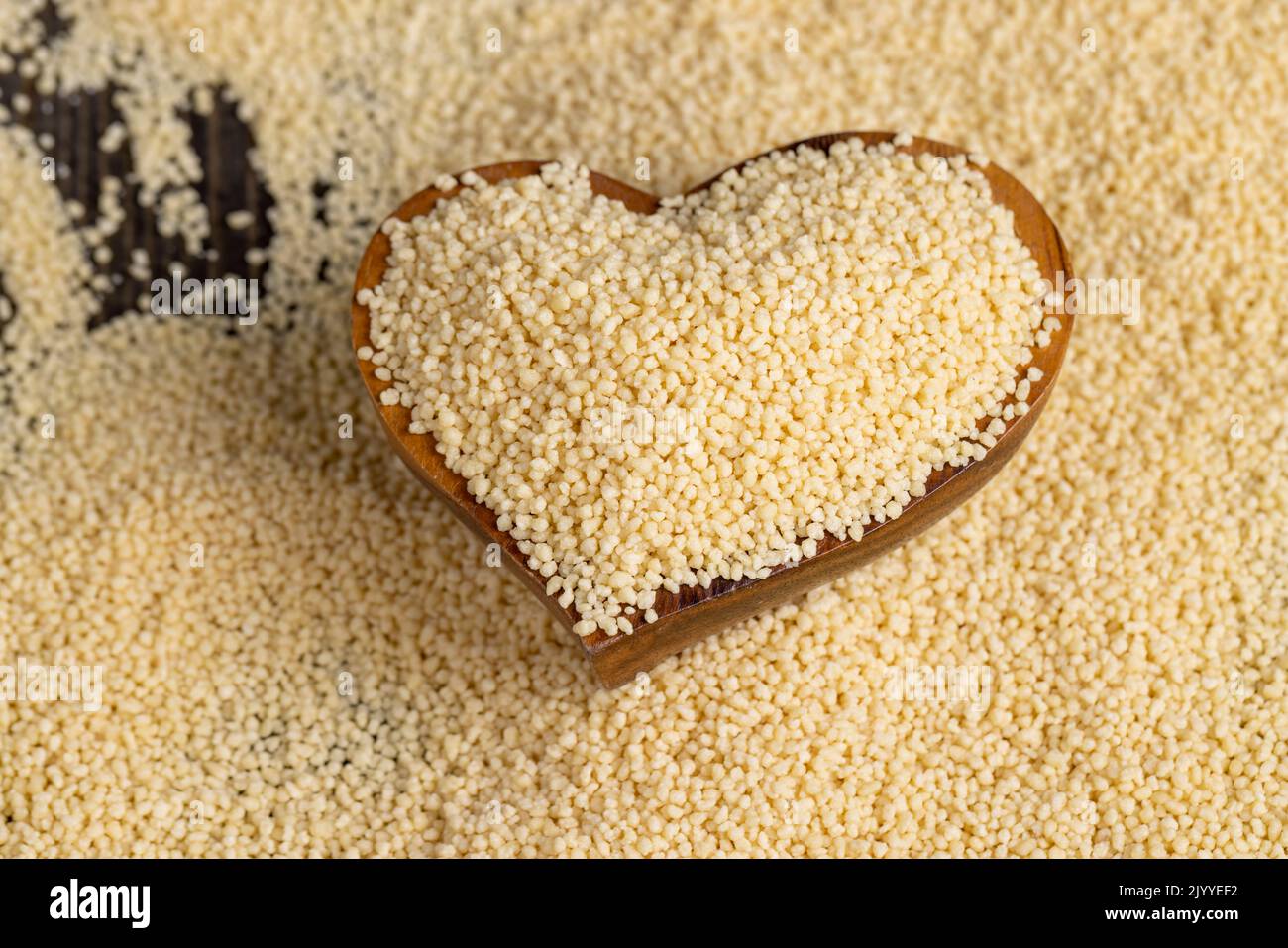 Fresh raw porridge couscous from wheat or millet, cooking dishes from traditional cereals of