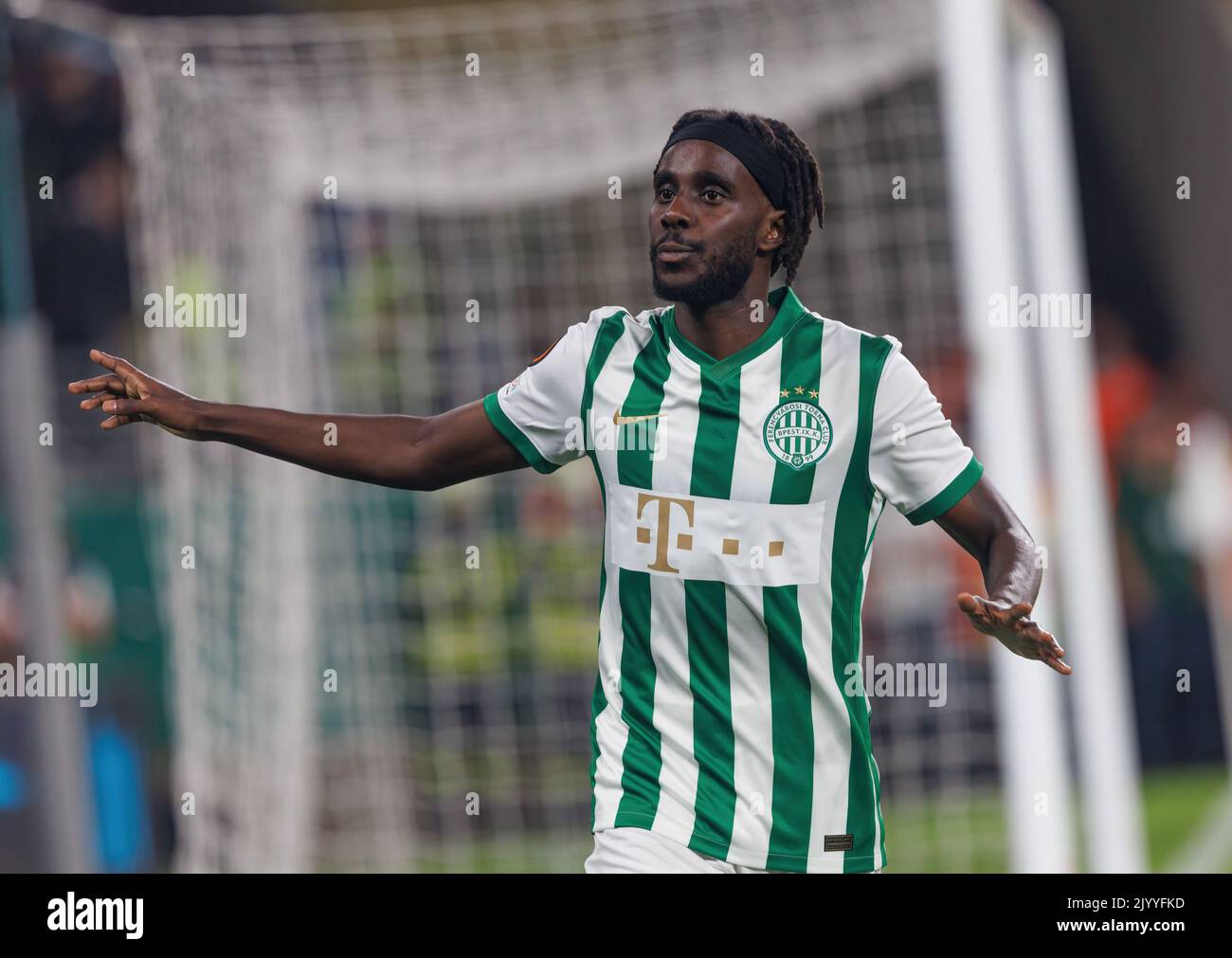 BUDAPEST, HUNGARY - AUGUST 29: (l-r) Tokmac Chol Nguen of Ferencvarosi TC  celebrates his goal in front of Gergo Lovrencsics of Ferencvarosi TC during  the UEFA Europa League Play-off Second Leg match