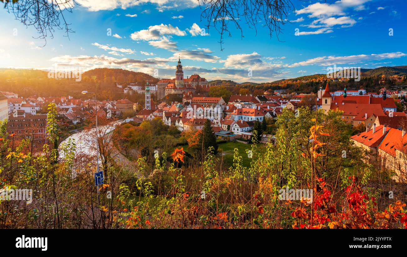 View of historical centre of Cesky Krumlov town on Vltava riverbank on autumn day overlooking medieval Castle, Czech Republic. View of old town of Ces Stock Photo