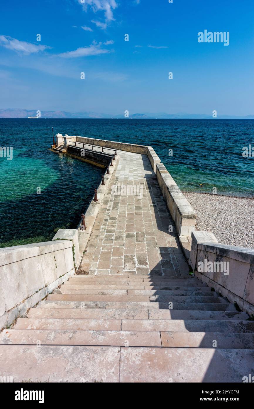 Kaiser Wilhelm's bridge and walkway a stone swim platform in Corfu, Greece Stock Photo