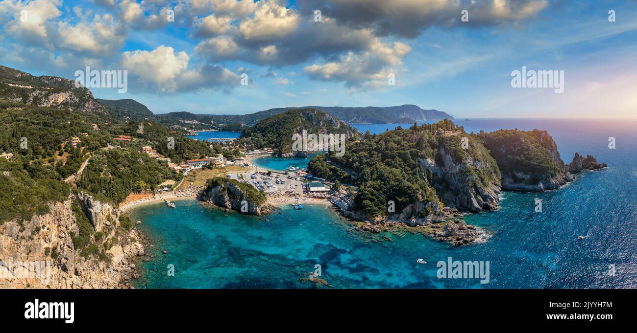 Picturesque seaside of Paleokastritsa, Corfu, Greece. Beautiful bay in Paleokastritsa in Corfu island, Greece. Panoramic view of Palaiokastritsa, boat Stock Photo
