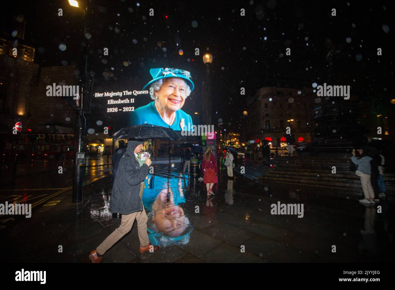London, England, UK. 8th Sep, 2022. A tributet to Queen Elizabeth II is on display on giant screen in Piccadilly Circus after her death announcement. (Credit Image: © Tayfun Salci/ZUMA Press Wire) Stock Photo