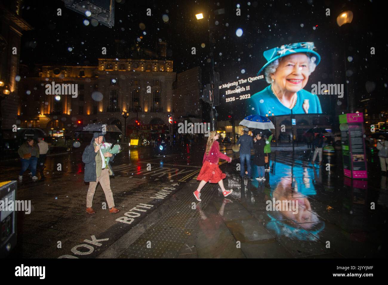London, England, UK. 8th Sep, 2022. A tributet to Queen Elizabeth II is on display on giant screen in Piccadilly Circus after her death announcement. (Credit Image: © Tayfun Salci/ZUMA Press Wire) Stock Photo